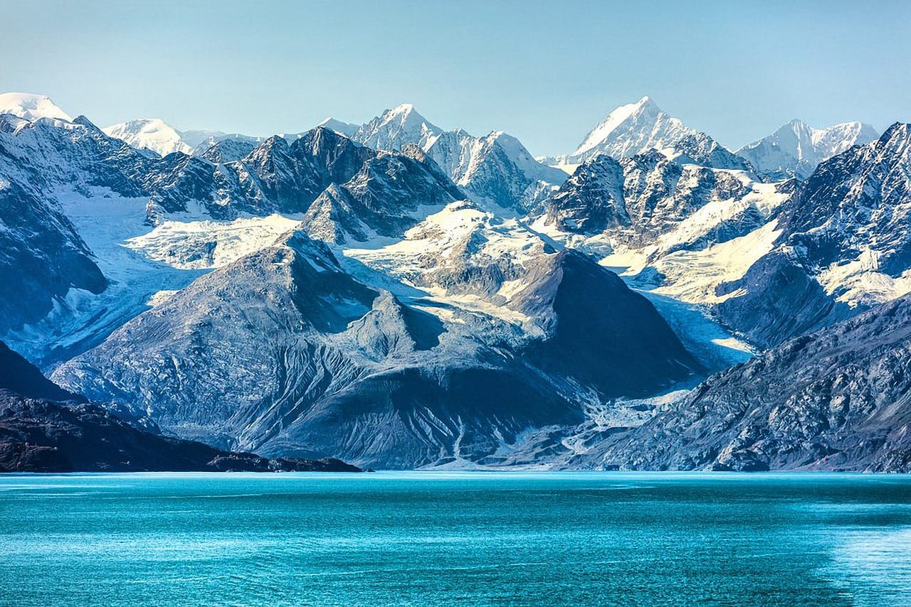 Alaska glaciers meeting turquoise sea